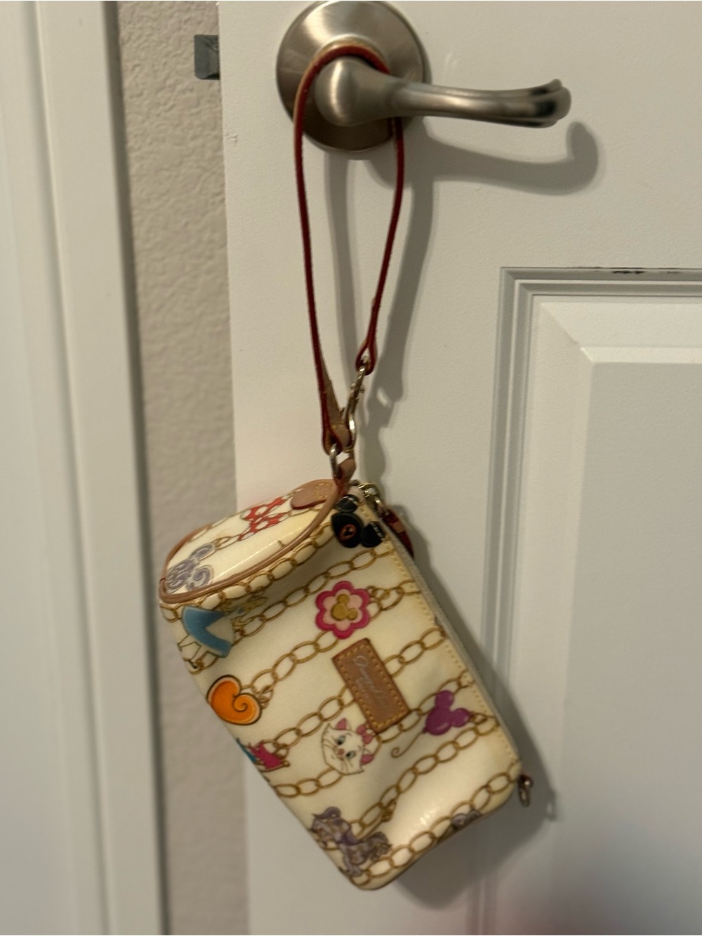 Dooney & Bourke Cream Multicolor Disney Chain-Print Wristlet with Red Strap - Picture 4 of 4